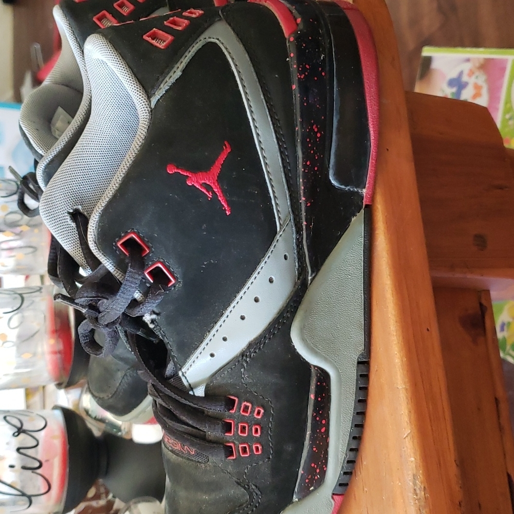 Low top basketball shoes, Jordan's, size 6Y, black, grey and red.